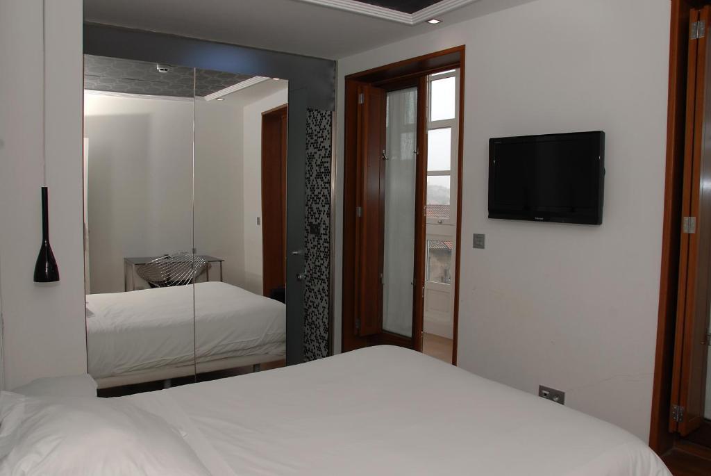 Отель Casas Reais Boutique Сантьяго-де-Компостела Номер фото
