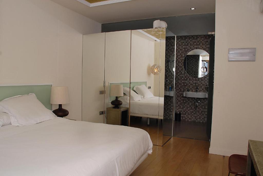 Отель Casas Reais Boutique Сантьяго-де-Компостела Номер фото