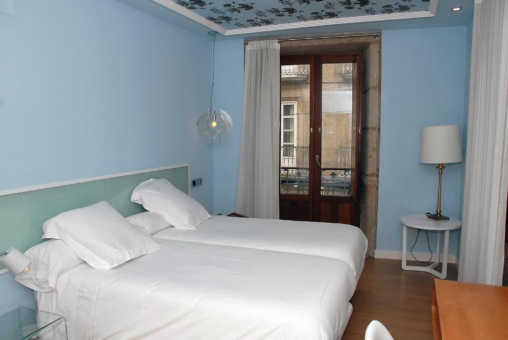 Отель Casas Reais Boutique Сантьяго-де-Компостела Номер фото